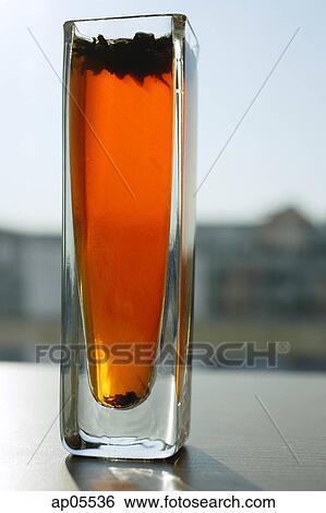 Still life of tea in glass View Large Photo Image Stock Photograph - Still life of tea in glass. Fotosearch