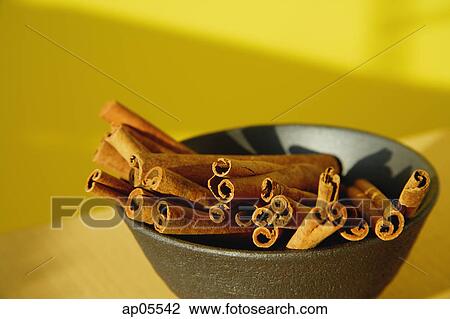 Still life shot of Cinnamon sticks in bowl View Large Photo Image Stock Image - Still life shot of Cinnamon sticks in bowl. Fotosearch