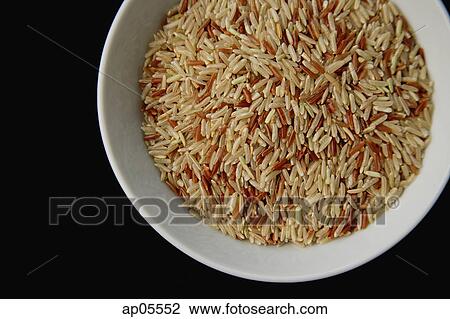 Still life, uncooked rice in a bowl View Large Photo Image Stock Image - Still life, uncooked rice in a bowl. Fotosearch