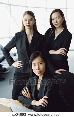 Three businesswomen, looking at camera, portrait View Large Photo Image Stock Image - Three businesswomen, looking at camera, portrait. Fotosearch