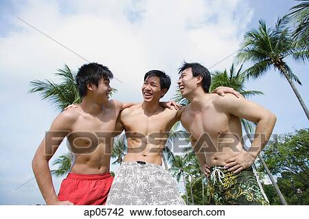 Three men with arms around each other View Large Photo Image Stock Image - Three men with arms around each other. Fotosearch