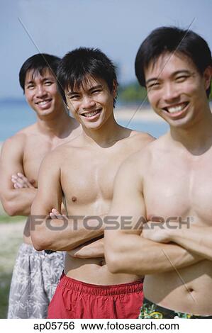 Three men with arms crossed, in a row View Large Photo Image Stock Photograph - Three men with arms crossed, in a row. Fotosearch