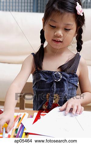 Young girl drawing View Large Photo Image Picture - Young girl drawing. Fotosearch