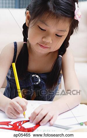 Young girl drawing with coloured pencils View Large Photo Image Stock Photography - Young girl drawing with coloured pencils. Fotosearch
