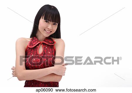 Young woman looking at camera, portrait View Large Photo Image Stock Image - Young woman looking at camera, portrait. Fotosearch