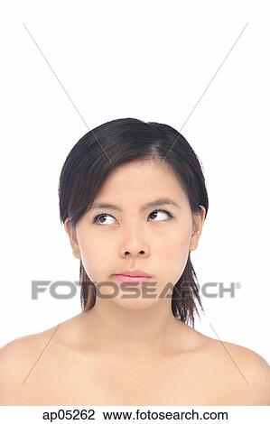 Young woman looking up, sideways glance View Large Photo Image Stock Image - Young woman looking up, sideways glance. Fotosearch