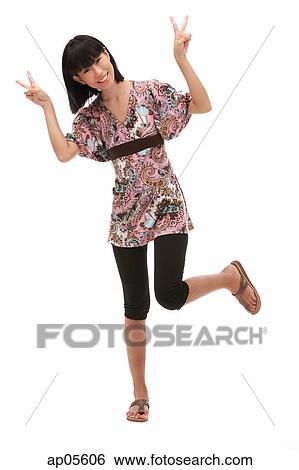 Stock Photograph - Young woman making hand sign. Fotosearch