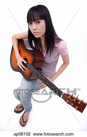 Young woman with guitar View Large Photo Image Stock Image - Young woman with guitar. Fotosearch
