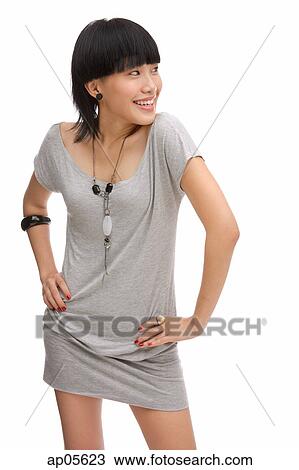 Young woman with hands on hips View Large Photo Image Stock Image - Young woman with hands on hips. Fotosearch