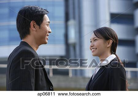 Businesswoman and businessman talking View Large Photo Image Stock Image - Businesswoman and businessman talking. Fotosearch