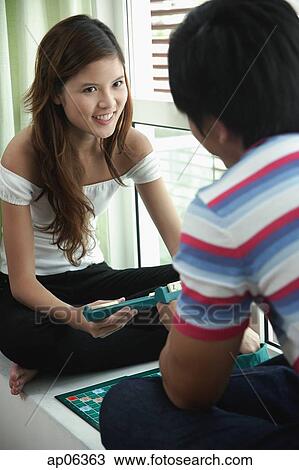 Couple playing scrabble View Large Photo Image Stock Image - Couple playing scrabble. Fotosearch