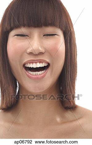 Young woman with fringe, laughing View Large Photo Image Stock Image - Young woman with fringe, laughing. Fotosearch