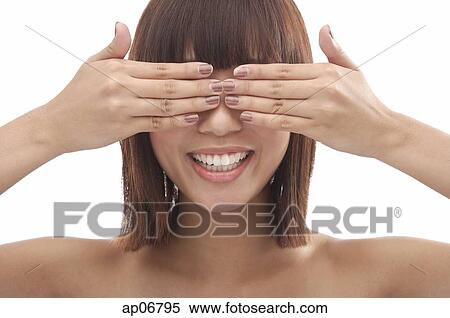 Young woman with hands covering eyes View Large Photo Image Stock Photography - Young woman with hands covering eyes. Fotosearch