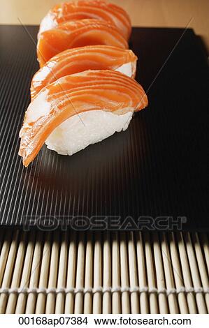 4 pieces of salmon sushi, nigiri View Large Photo Image Picture - 4 pieces of salmon sushi, nigiri. Fotosearch