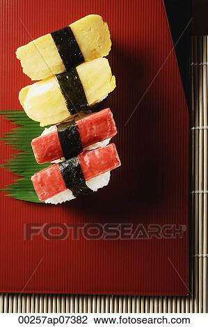 4 pieces of sushi, kanikama and tamago nigiri View Large Photo Image Stock Image - 4 pieces of sushi, kanikama and tamago nigiri. Fotosearch