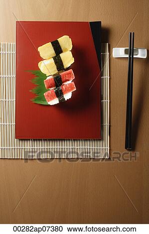 4 pieces of sushi, kanikama and tamago nigiri View Large Photo Image Stock Image - 4 pieces of sushi, kanikama and tamago nigiri. Fotosearch