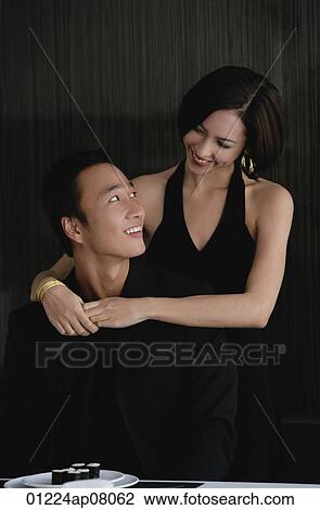Stock Image - A couple have dinner together. Fotosearch