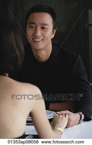 A couple have dinner together View Large Photo Image Stock Photo - A couple have dinner together. Fotosearch