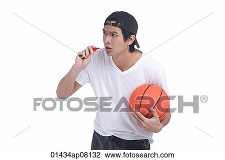 A man holds a basketball View Large Photo Image Stock Image - A man holds a basketball. Fotosearch