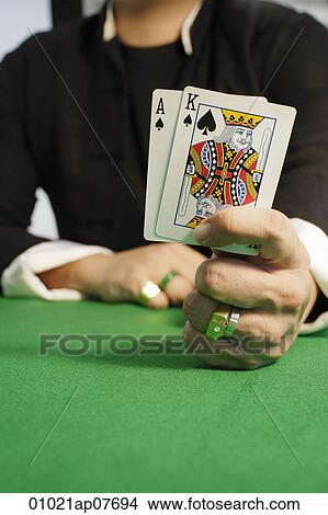A man playing cards View Large Photo Image Picture - A man playing cards. Fotosearch