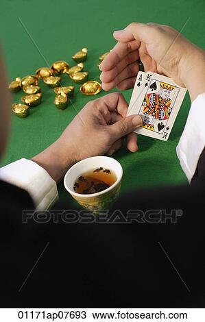 A man playing cards View Large Photo Image Stock Image - A man playing cards. Fotosearch