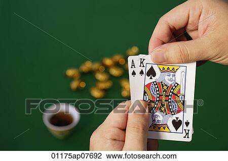 A man playing cards View Large Photo Image Stock Image - A man playing cards. Fotosearch