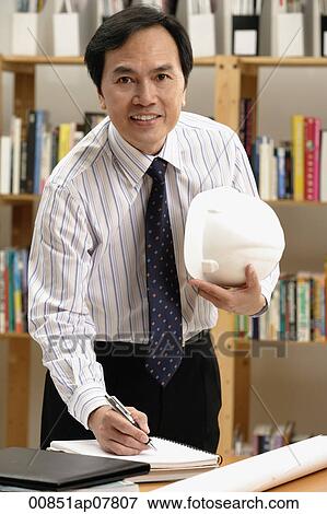 A man working View Large Photo Image Stock Photo - A man working. Fotosearch