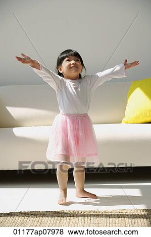 A small girl in a ballerina costume View Large Photo Image Stock Photo - A small girl in a ballerina costume. Fotosearch