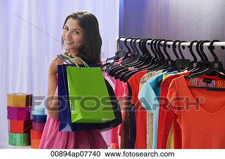 A teenage girl out shopping View Large Photo Image Stock Image - A teenage girl out shopping. Fotosearch