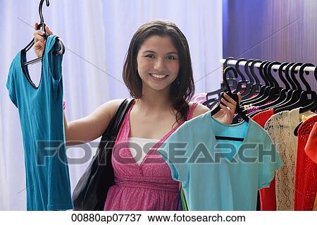 A teenage girl out shopping View Large Photo Image Stock Photo - A teenage girl out shopping. Fotosearch