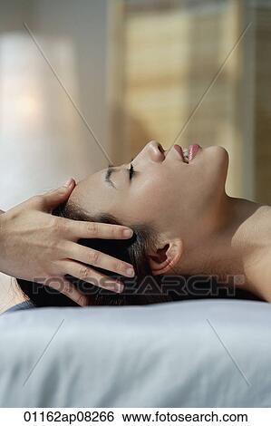 A woman has a relaxing massage View Large Photo Image Stock Photograph - A woman has a relaxing massage. Fotosearch