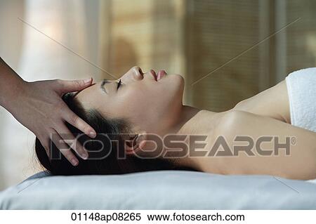 A woman has a relaxing massage View Large Photo Image Stock Photography - A woman has a relaxing massage. Fotosearch