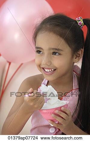 A young girl at a party with balloons View Large Photo Image Picture - A young girl at a party with balloons. Fotosearch