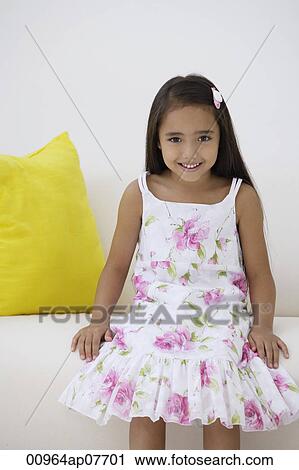 A young girl sits down View Large Photo Image Stock Image - A young girl sits down. Fotosearch