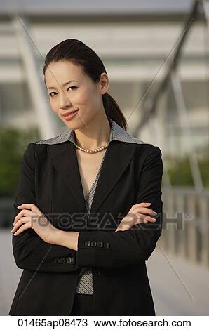 Businesswoman looking at camera View Large Photo Image Stock Image - Businesswoman looking at camera. Fotosearch
