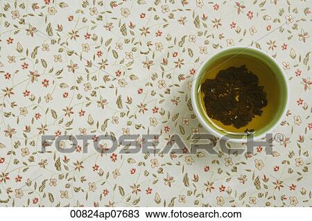 Chinese tea on a patterned surface View Large Photo Image Stock Image - Chinese tea on a patterned surface. Fotosearch