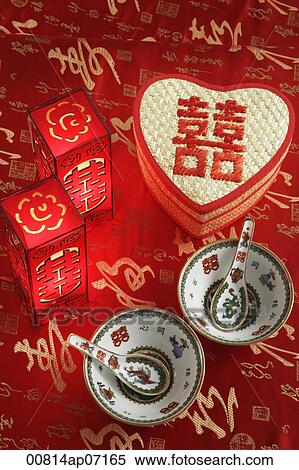 Double happiness heart-shaped box, traditional wedding lamps, Chinese bowls and spoons View Large Photo Image Stock Photography - Double happiness heart-shaped box, traditional wedding lamps, Chinese bowls and spoons. Fotosearch