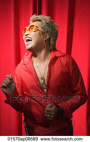 Man in hip hop outfit having fun View Large Photo Image Stock Photo - Man in hip hop outfit having fun. Fotosearch