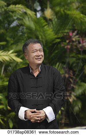 Stock Image - Man in traditional Chinese clothing. Fotosearch