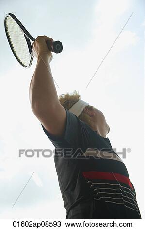 Man playing tennis View Large Photo Image Stock Image - Man playing tennis. Fotosearch