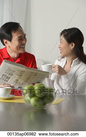Mature couple at home having coffee View Large Photo Image Stock Image - Mature couple at home having coffee. Fotosearch