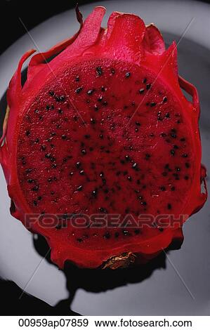 Sliced dragon fruit View Large Photo Image Stock Photo - Sliced dragon fruit. Fotosearch