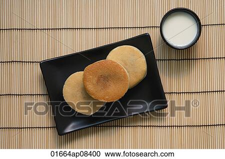 Still life of Chinese pancake filled with red bean paste View Large Photo Image Stock Image - Still life of Chinese pancake filled with red bean paste. Fotosearch