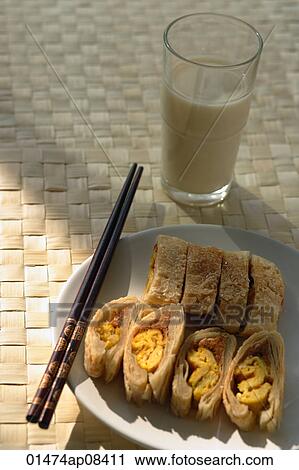 Stock Image - Still life of pastry with pork floss and egg yolk. Fotosearch