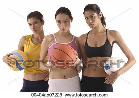 three women of different race, holding volleyball, basketball, and rugby ball, looking at camera View Large Photo Image Stock Photo - three women of different race, holding volleyball, basketball, and rugby ball, looking at camera. Fotosearch