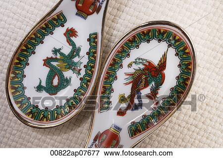 Traditional dragon and phoenix spoons View Large Photo Image Stock Photo - Traditional dragon and phoenix spoons. Fotosearch