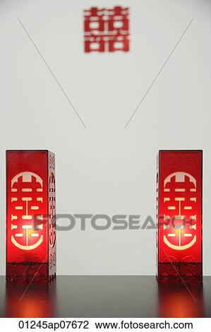 Two red lamps with candles View Large Photo Image Stock Image - Two red lamps with candles. Fotosearch