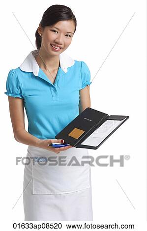 Waitress presents bill, smiling at camera View Large Photo Image Stock Image - Waitress presents bill, smiling at camera. Fotosearch