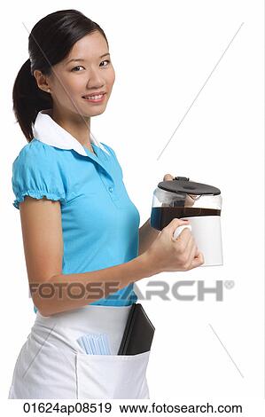 Waitress smiling at camera, pouring coffee View Large Photo Image Stock Photo - Waitress smiling at camera, pouring coffee. Fotosearch