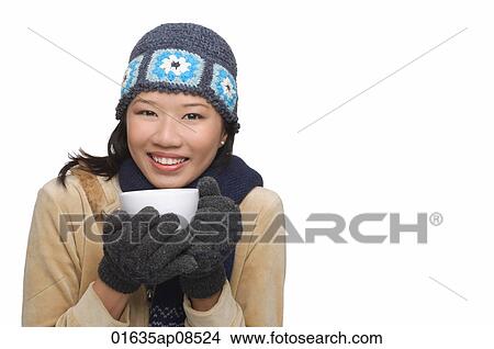 Woman freezing and smiling at camera View Large Photo Image Picture - Woman freezing and smiling at camera. Fotosearch